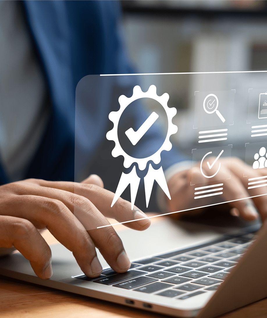 Person typing with digital certification icon overlay.